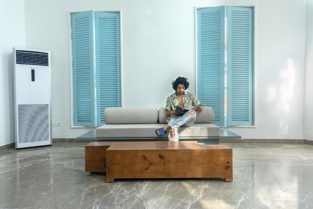 Resort exterior and pool at dusk